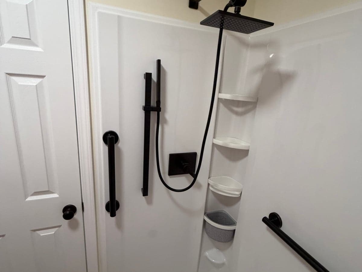 low-threshold acrylic walk-in shower with grab bars in Clarksville, TN by JM Home and Property Services (2)