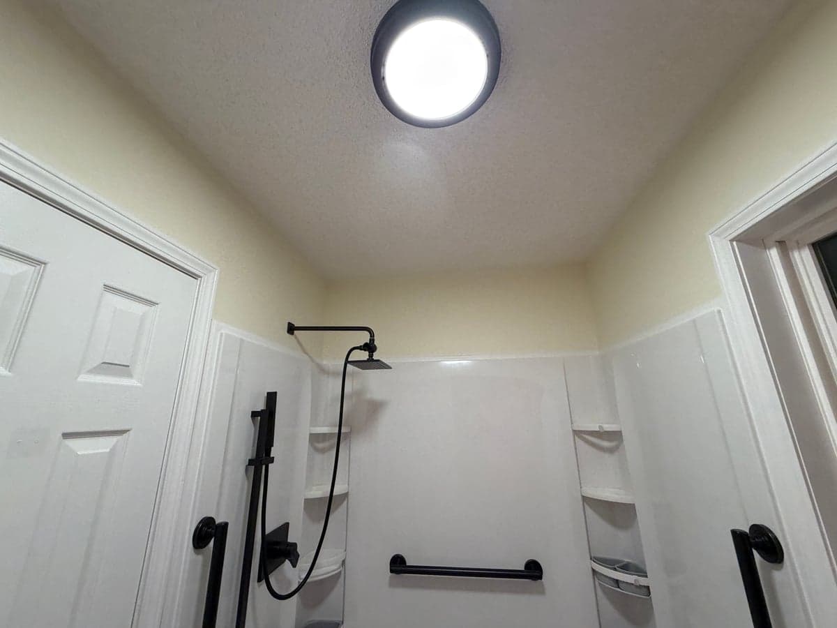 low-threshold acrylic walk-in shower with grab bars in Clarksville, TN by JM Home and Property Services (3)