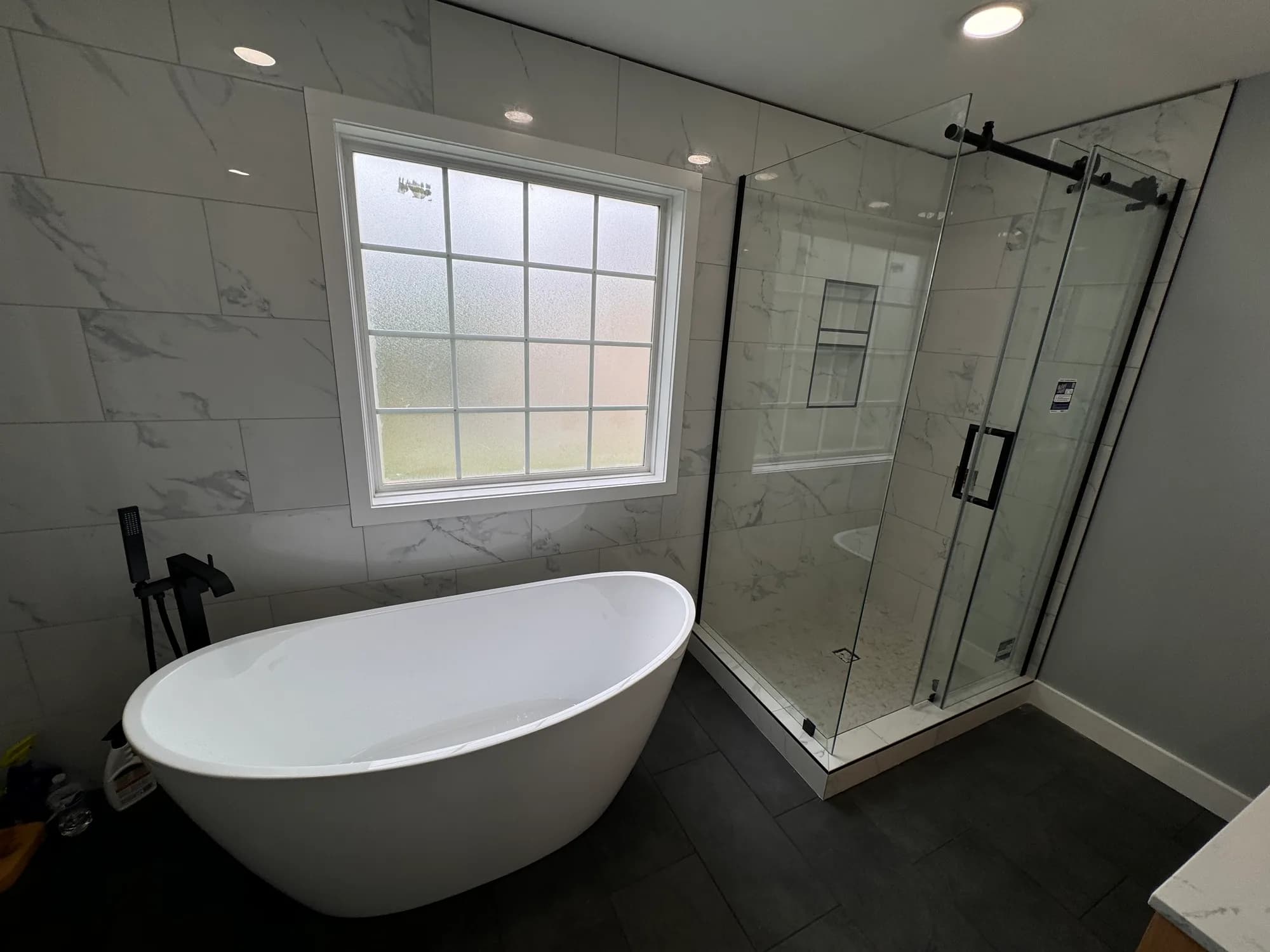 Bathroom remodel with tile shower and vanity in Clarksville, TN by JM Home and Property Services